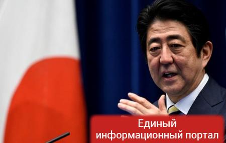 Премьер Японии вновь призывает Путина обсудить мирный договор