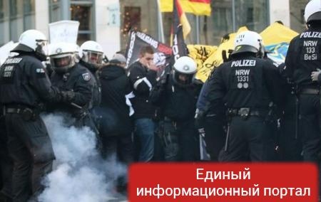 Разгон митинга в Кельне: пострадали трое полицейских и журналист