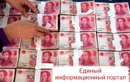 Китай резко снизил курс юаня