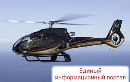 В России вертолет упал в озеро: двое погибших