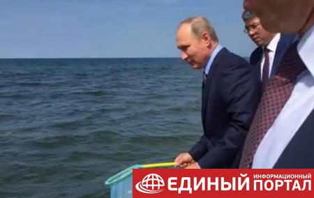 Путин выпустил в Байкал молодь омуля