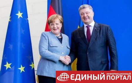 Меркель осенью приедет в Украину - Порошенко