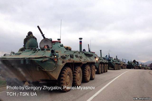 10 БТРов войск РФ едут на Симферополь со стороны Инкермана, вооруженные " Калашниковыми " и СВД.
