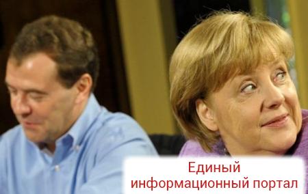 Медведев и Меркель обсудили выполнение минских договоренностей