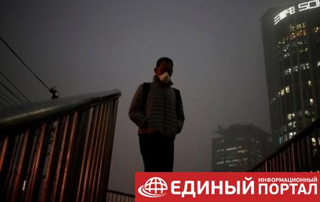 В Пекине объявили оранжевый уровень опасности из-за тумана
