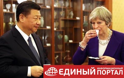 Мэй предсказывает "золотой век" в отношениях с Китаем