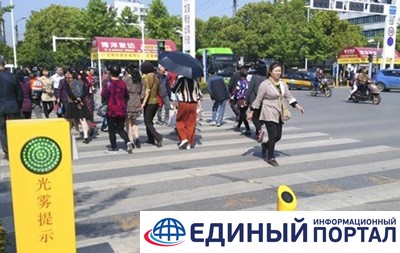 В Китае пешеходов-нарушителей будут обливать водой