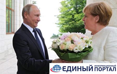 Путин и Меркель обсудили транзит газа по Украине