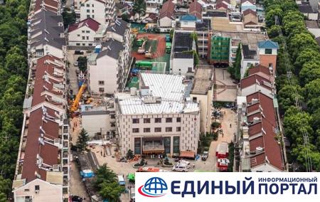 Обрушение отеля в Китае: число жертв удвоилось