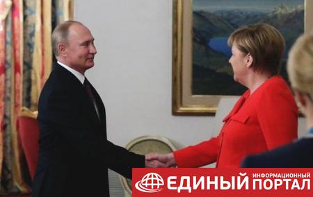 Путин и Меркель обсуждают мигрантов два дня подряд